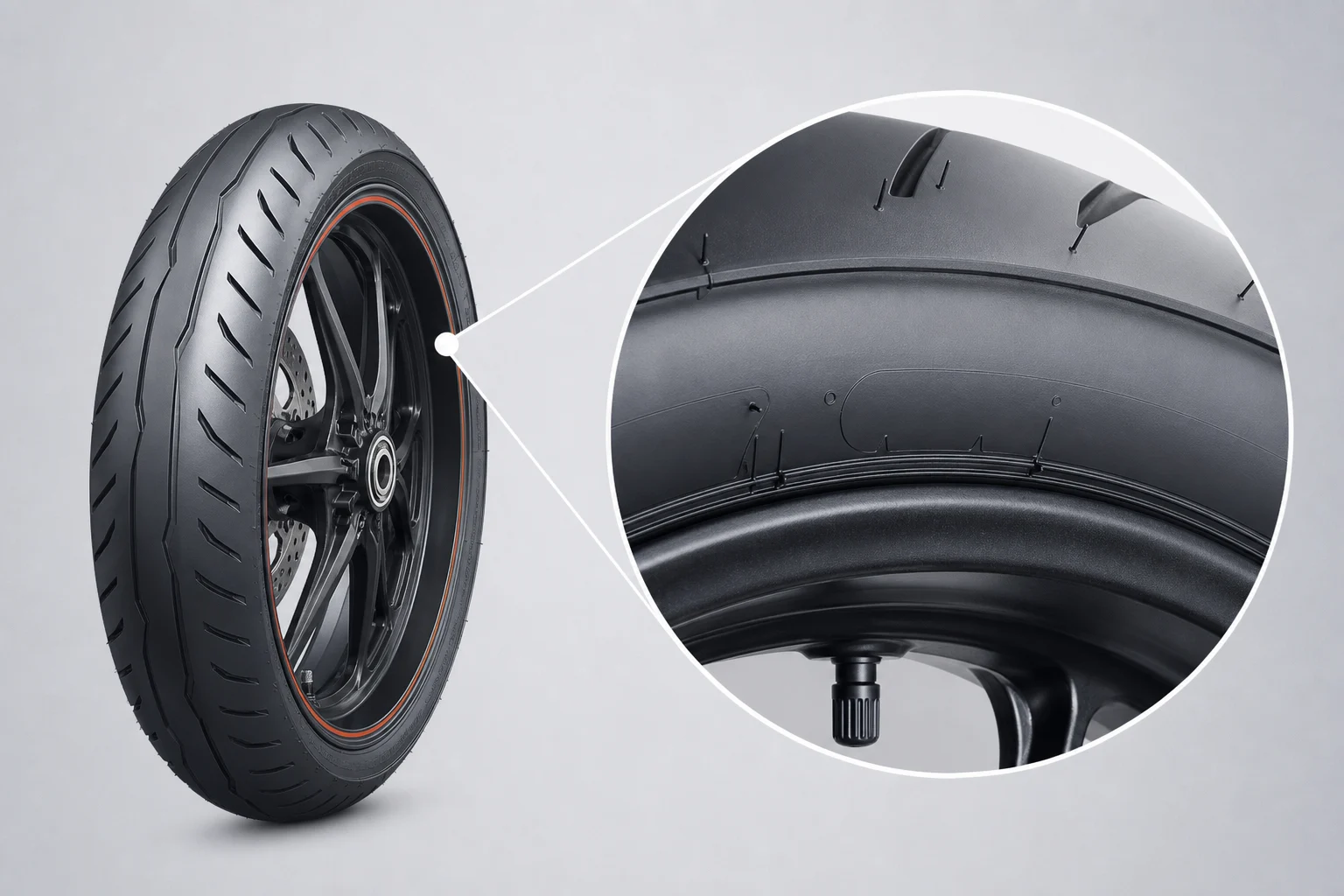 Motorcycle tyre sidewall with its technical codes moulded into it.